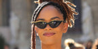 Yasmin Finney was seen wearing black and gold Valentino V-GOLDCUT-II VLS 114A cat eye sunglasses to attend the Valentino Spring/Summer 2024 fashion show during Paris Fashion Week