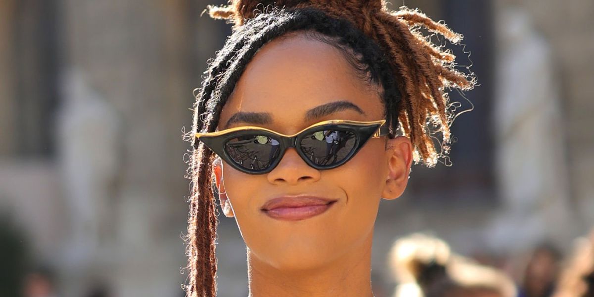Yasmin Finney was seen wearing black and gold Valentino V-GOLDCUT-II VLS 114A cat eye sunglasses to attend the Valentino Spring/Summer 2024 fashion show during Paris Fashion Week