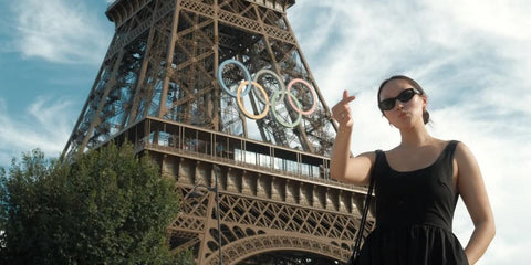 Australian actress Yerin Ha was seen wearing black Prada PR 26ZS 16K08Z cat eye sunglasses at the Paris Olympics 2024.