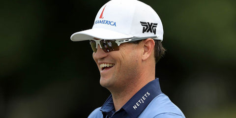 Zach Johnson was seen wearing Oakley Flak 2.0 XL OO9188 8259 Prizm Polarised wraparound sunglasses