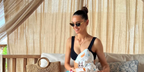Belarusian model Zhenya Katava was seen ewaring gold Bottega Veneta BV1186S 002 cat eye sunglasses in her Instagram post, September 2023. Shop online now on Pretavoir