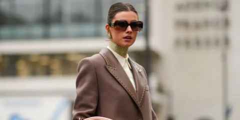 Zita D'Hauteville was seen wearing transparent brown Versace 4405 5332/13 butterfly sunglasses with brown gradient lenses to attend the Fendi Spring/Summer 2022 haute couture fashion show during Paris Couture Week