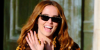 Zoey Deutch wore black Valentino La Coureuse VG0044S 001 sunglasses at the Valentino Spring Summer 2027 show during Paris Fashion Week.