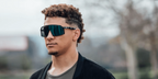 Kansas City Chiefs Patrick Mahomes wearing Oakley Sutro shield sunglasses in black
