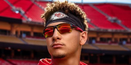 Kansas City Chiefs player Patrick Mahomes wearing Oakley Flak 2.0 sunglasses with a red lens
