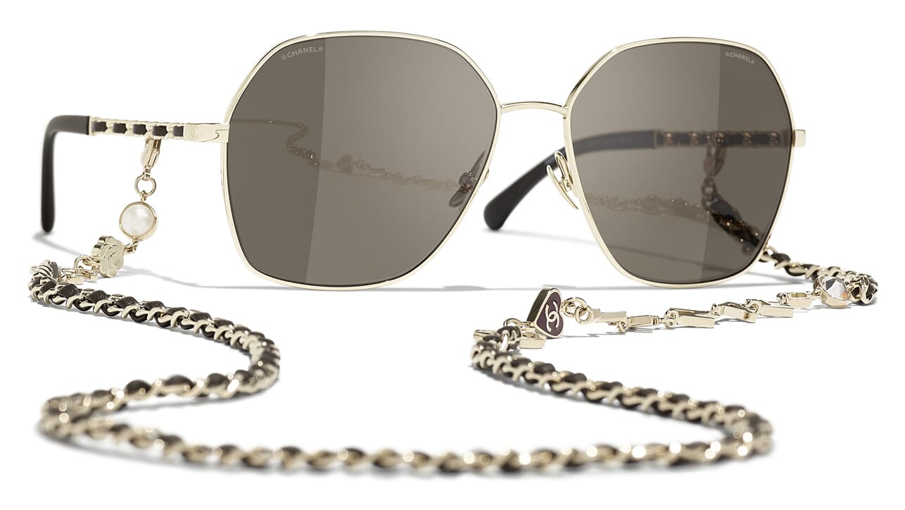Chanel: Authentic Sunglasses Model # 4147 Col.125/73